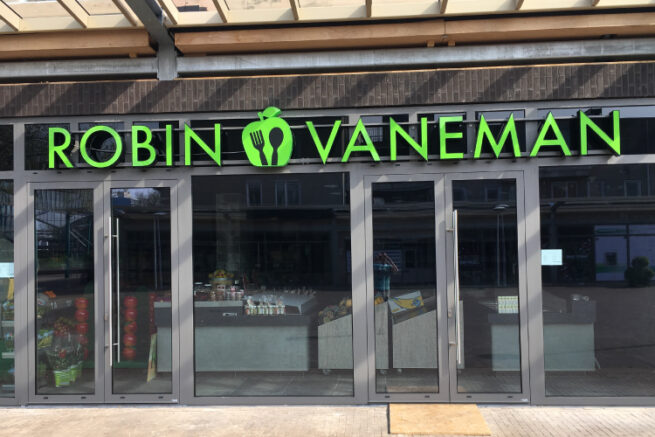 Signing Robin Vaneman